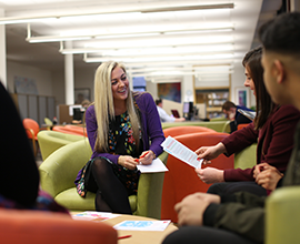 A group of students sat in study zone area chatting